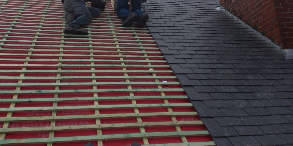 Ardoise ou tuile : quel matériau choisir pour sa toiture à Amiens ?